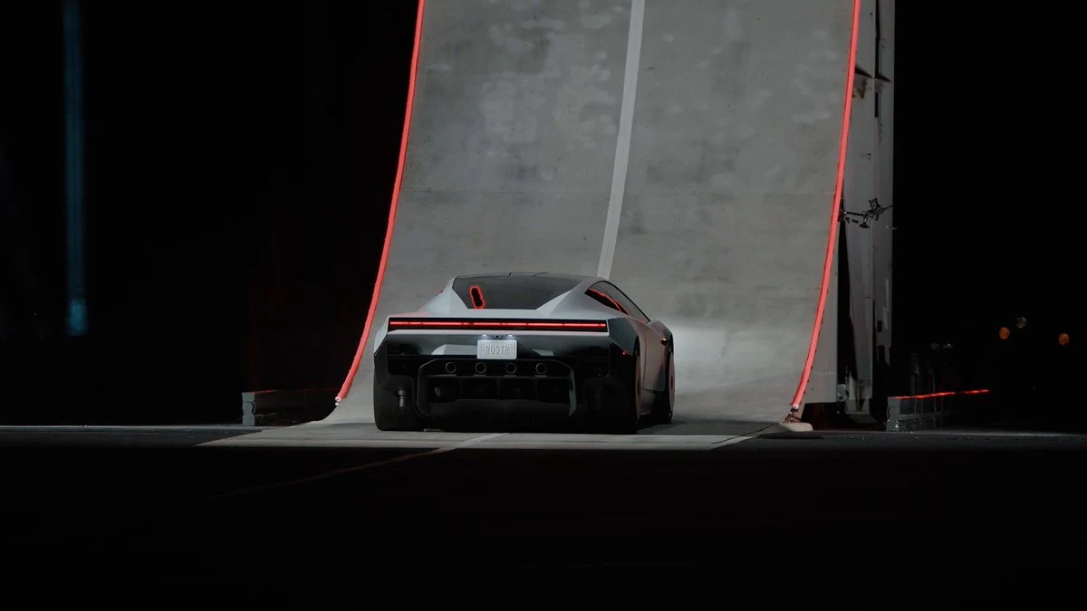 Tesla Roadster at the bottom of the curved launch ramp at the October 2026 unveiling (still from Tesla's official video)